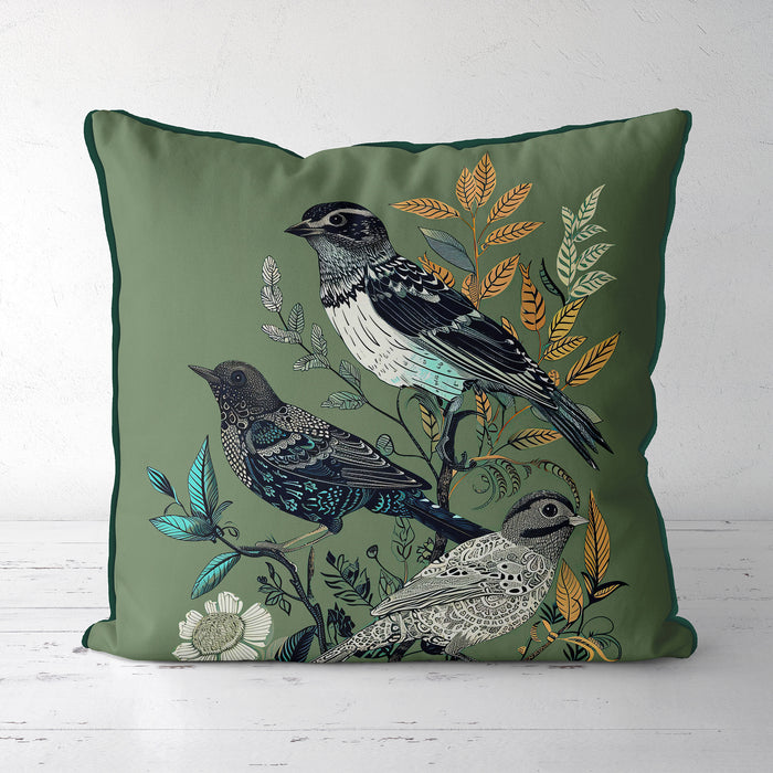 Handmade cushion/pillow cover illustration of a flock of birds perched on branches on a turqouise blue background