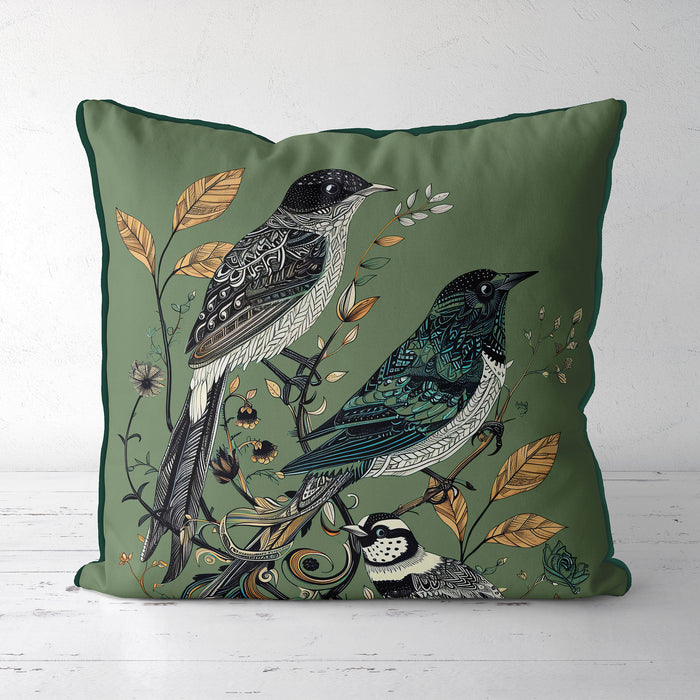 Handmade cushion/pillow cover illustration of a flock of birds perched on branches on a turqouise blue background