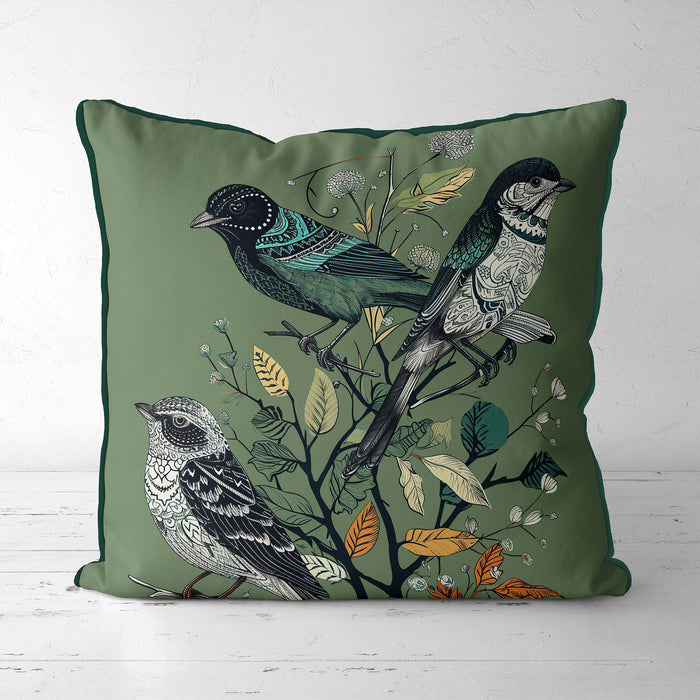 Handmade cushion/pillow cover illustration of a flock of birds perched on branches on a turqouise blue background