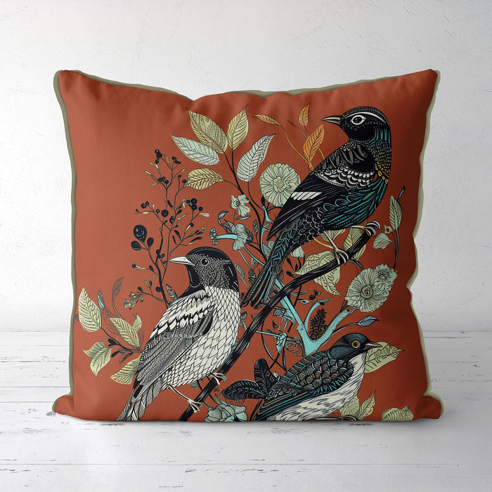 Handmade cushion/pillow cover illustration of a flock of birds perched on branches on a green background