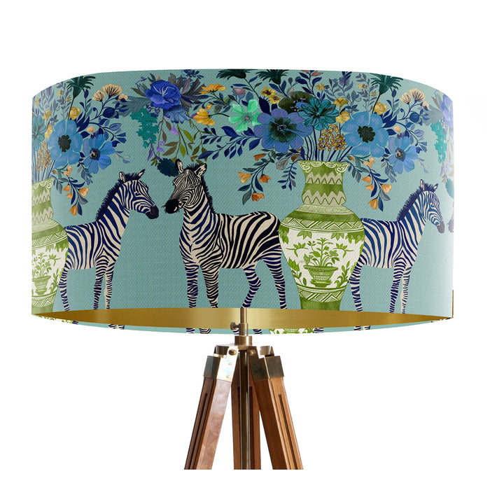 A maximalist design of Zebra's, chinoiserie vases and colourful flowers on a blue green mint backdrop on a Extra large sized 45x25cm handcrafted fabric lampshade by artist Kelly Stevens-McLaughlan