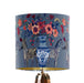 A maximalist design of Zebra's, chinoiserie vases and colourful flowers on a blue backdrop on a small sized 20x18cm handcrafted fabric lampshade by artist Kelly Stevens-McLaughlan