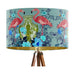 A maximalist design of pink flamingos, chinoiserie vases and colourful flowers on a blue green mint backdrop on a large sized 40x25cm handcrafted fabric lampshade by artist Kelly Stevens-McLaughlan