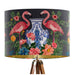 A maximalist design of pink flamingos, chinoiserie vases and colourful flowers on a charcoal backdrop on a classic sized 30x21cm handcrafted fabric lampshade by artist Kelly Stevens-McLaughlan