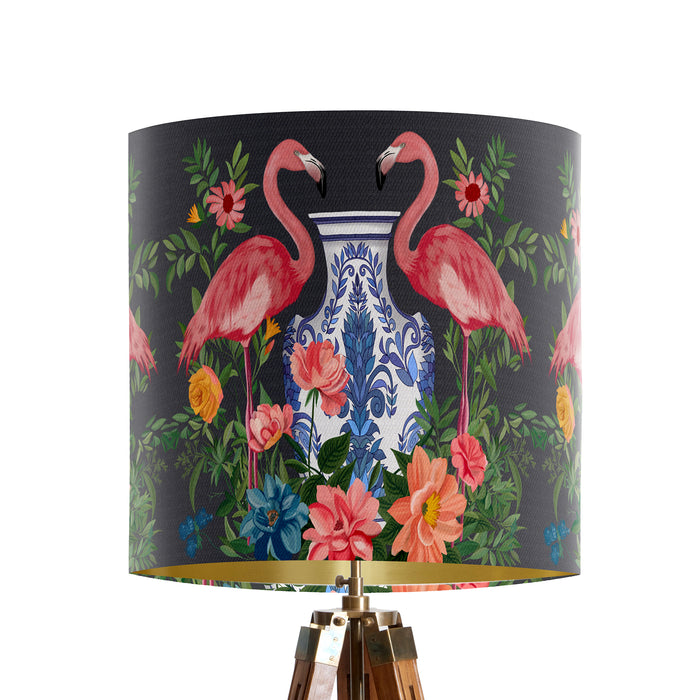 A maximalist design of pink flamingos, chinoiserie vases and colourful flowers on a charcoal backdrop on a small sized 20x18cm handcrafted fabric lampshade by artist Kelly Stevens-McLaughlan