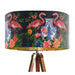 A maximalist design of pink flamingos, chinoiserie vases and colourful flowers on a charcoal backdrop on a Extra large sized 45x25cm handcrafted fabric lampshade by artist Kelly Stevens-McLaughlan