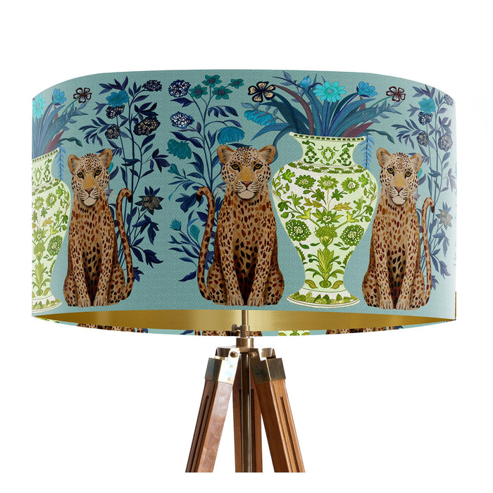 A maximalist design of leopards, chinoiserie vases and colourful flowers on a blue green mint backdrop on a Extra large sized 45x25cm handcrafted fabric lampshade by artist Kelly Stevens-McLaughlan