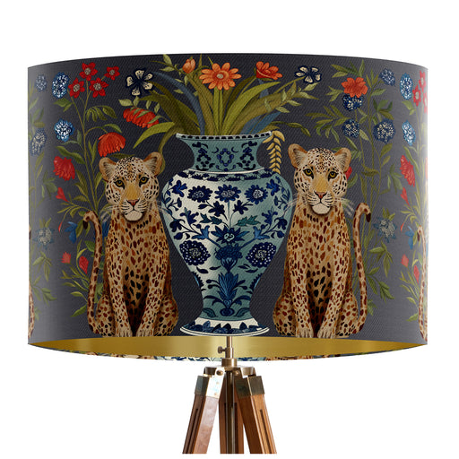 A maximalist design of leopards, chinoiserie vases and colourful flowers on a charcoal backdrop on a classic sized 30x21cm handcrafted fabric lampshade by artist Kelly Stevens-McLaughlan