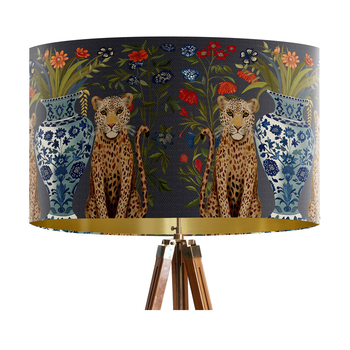 A maximalist design of leopards, chinoiserie vases and colourful flowers on a charcoal backdrop on a large sized 40x25cm handcrafted fabric lampshade by artist Kelly Stevens-McLaughlan