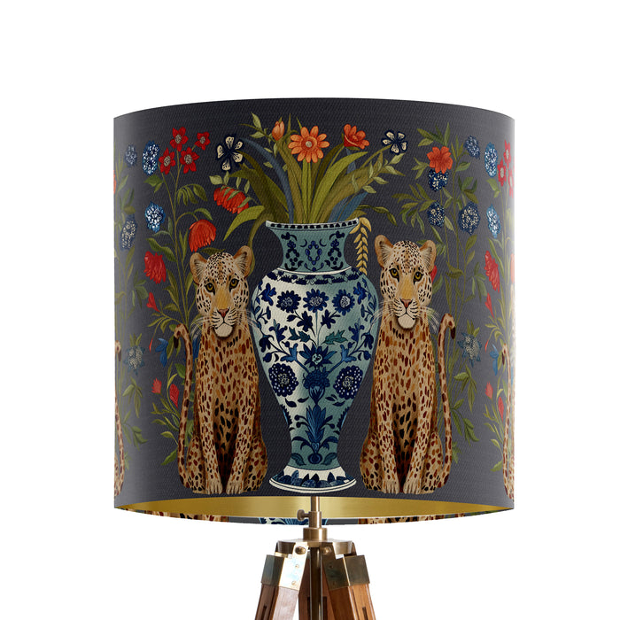 A maximalist design of leopards, chinoiserie vases and colourful flowers on a charcoal backdrop on a small sized 20x18cm handcrafted fabric lampshade by artist Kelly Stevens-McLaughlan