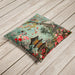 Teal velvet cushion with pagoda and blooming flowers, featuring birds perched on branches