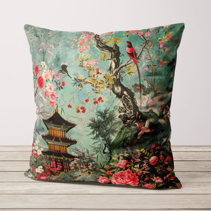 Teal velvet cushion with pagoda and blooming flowers, featuring birds perched on branches