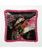 Luxury velvet cushion pillow cover of a woman with vibrant pink wings, wearing a floral dress and flower crown, set against a dark background with a butterfly motif. The pillow has a pink fringe border.