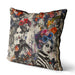 Striking decorative cushion, a fusion of gothic and bohemian styles. Two monochromatic women adorned with elaborate floral headdresses and butterflies splashed in vibrant colours, a dramatic and enchanting visual effect combining gothic elegance with bohemian flair.