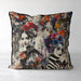 Striking decorative cushion, a fusion of gothic and bohemian styles. Two monochromatic women adorned with elaborate floral headdresses and butterflies splashed in vibrant colours, a dramatic and enchanting visual effect combining gothic elegance with bohemian flair.