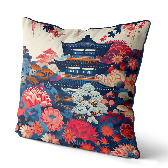 Blue and red floral cushion with a pagoda against a cream backdrop.