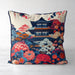 Blue and red floral cushion with a pagoda against a cream backdrop.