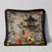 Grey velvet cushion with black fringed edge, featuring a pagoda and floral accents.