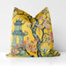 Yellow velvet cushion with pagoda and blooming flowers in a floral landscape.