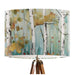 Scandi birch tree scene on a muted dusty jade background on a classic sized 30x21cm handcrafted fabric lampshade by artist Kelly Stevens-McLaughlan