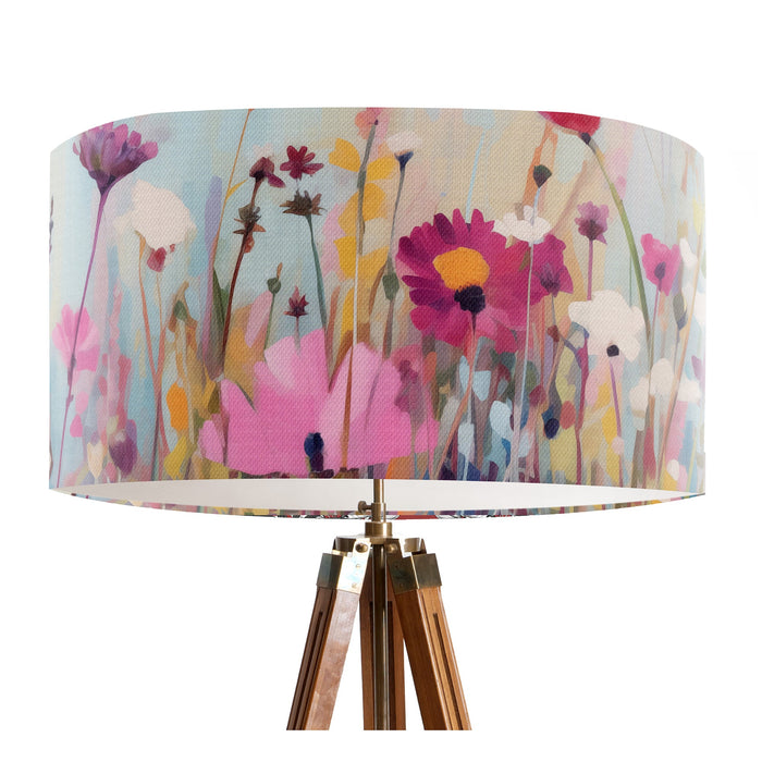 Delicate colourful wildflower design against a serene pale blue backdrop on a Extra large sized 45x25cm handcrafted fabric lampshade by artist Kelly Stevens-McLaughlan