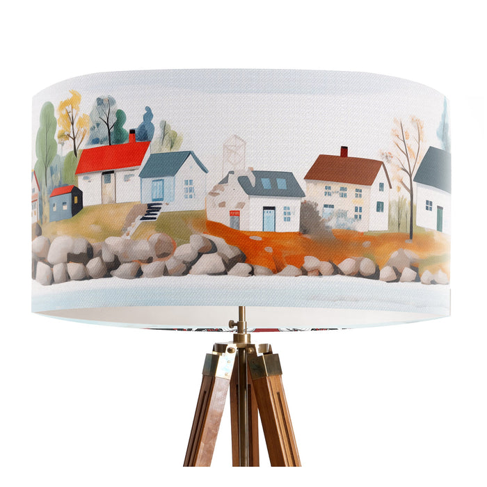 A vibrant whimsical Scandinavian coastal village design on a Extra large sized 45x25cm handcrafted fabric lampshade by artist Kelly Stevens-McLaughlan