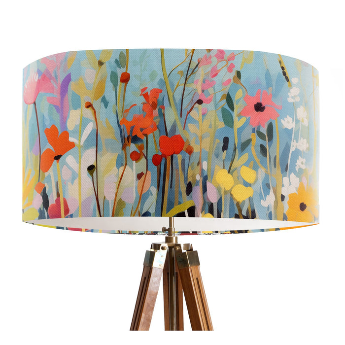 Vinrentia colourful wildflower design against a sky blue backdrop on a Extra large sized 45x25cm handcrafted fabric lampshade by artist Kelly Stevens-McLaughlan