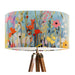 Vinrentia colourful wildflower design against a sky blue backdrop on a Extra large sized 45x25cm handcrafted fabric lampshade by artist Kelly Stevens-McLaughlan