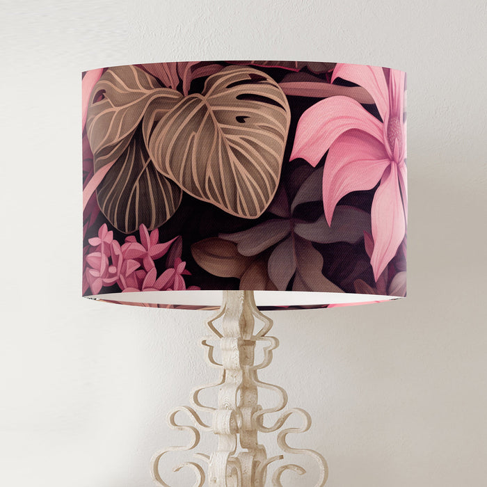 Pink and taupe tropical leaves and flowers, a lively design on a classic sized 30x21cm handcrafted fabric lampshade by artist Kelly Stevens-McLaughlan