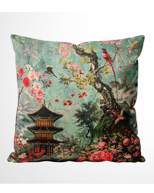 Teal velvet cushion with pagoda and blooming flowers, featuring birds perched on branches