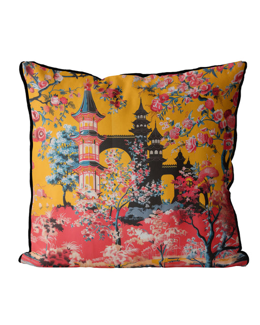 Yellow cushion with pagoda and pink and yellow blooming flowers.