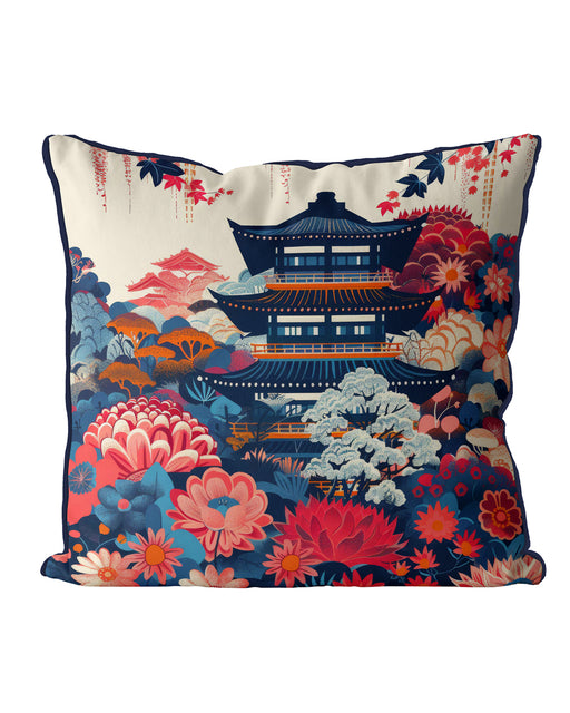 Blue and red floral cushion with a pagoda against a cream backdrop.